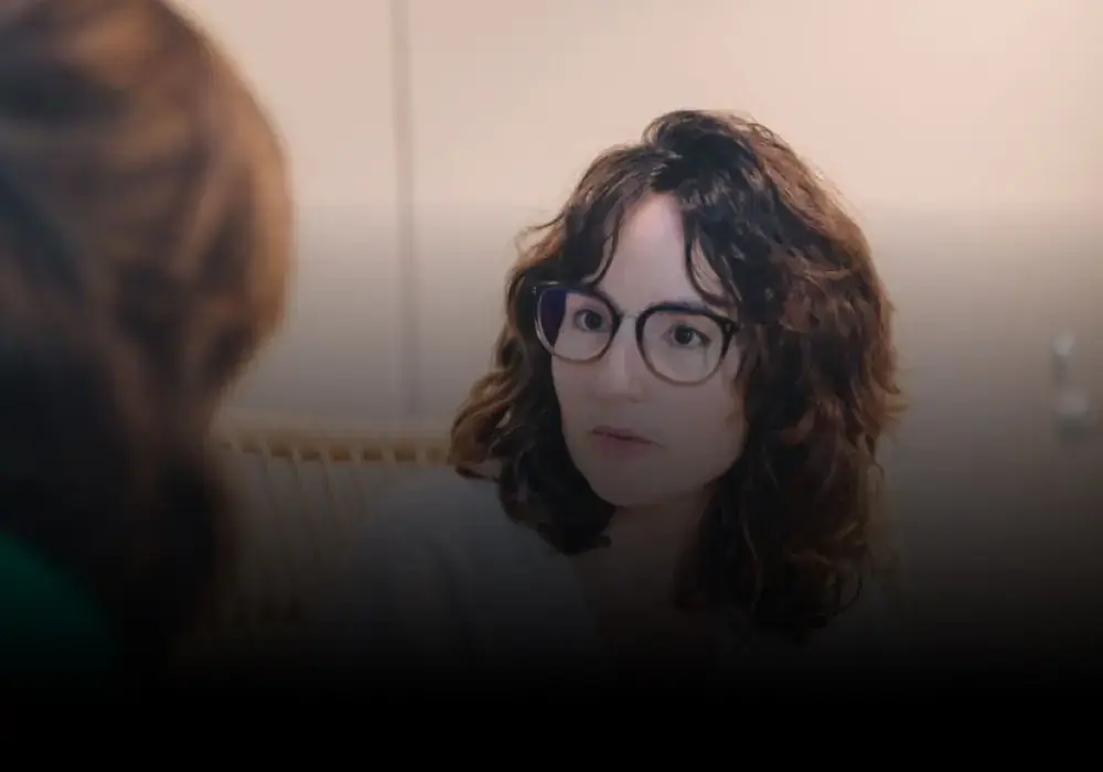 A team member listening during a meeting